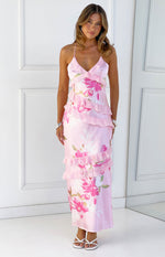 Pink floral print maxi dress with V-neck, spaghetti straps, and tiered ruffles down the front