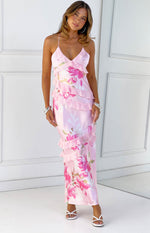 Pink floral print maxi dress with V-neck, spaghetti straps, and tiered ruffles down the front