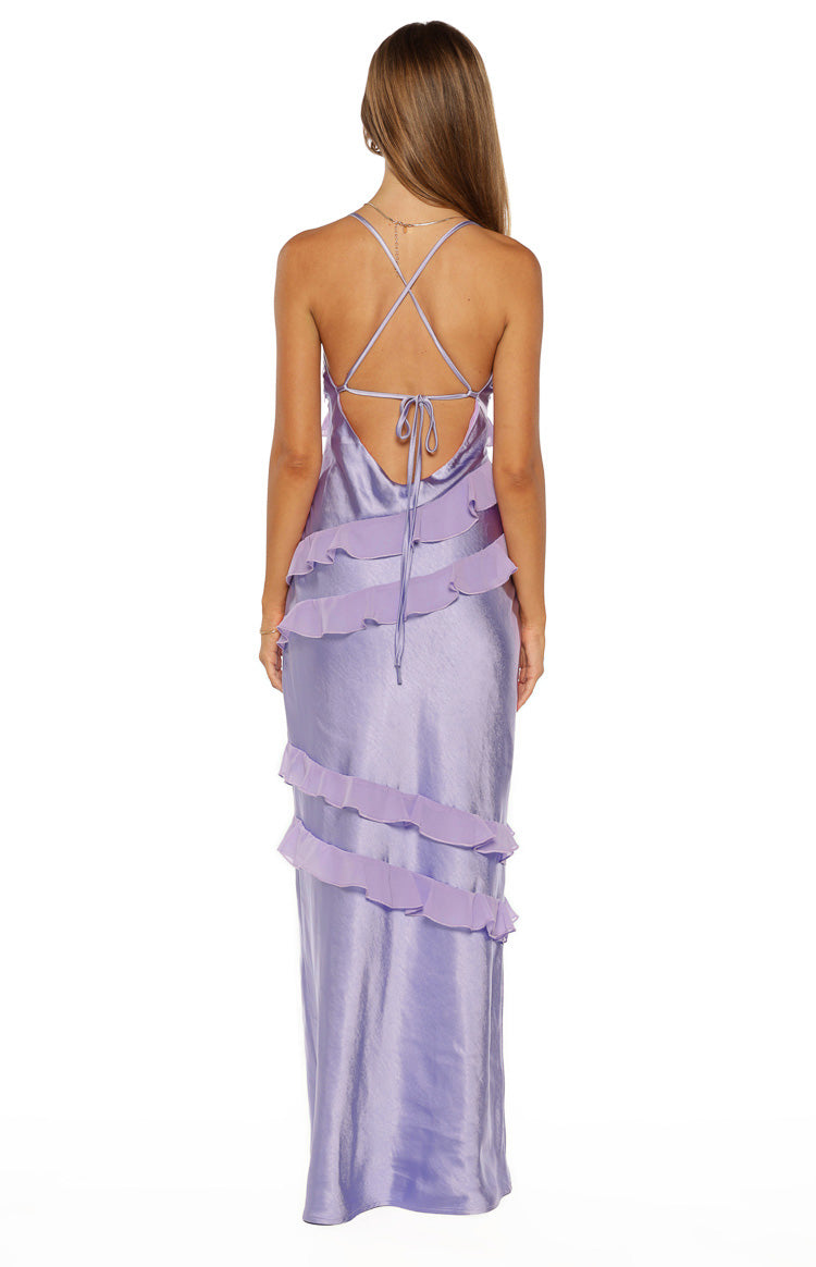 Rear view of a lilac satin maxi dress with criss-cross back straps, a low scoop back, and tiered ruffles