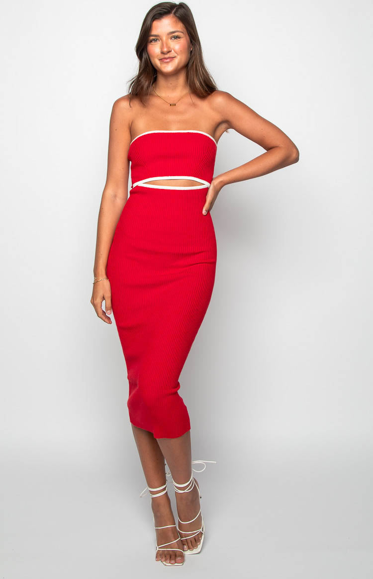 Red ribbed knit strapless midi dress with white trim along the neckline and waist cutouts