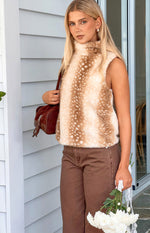 Upper body view of a brown deer print faux fur high neck sleeveless top