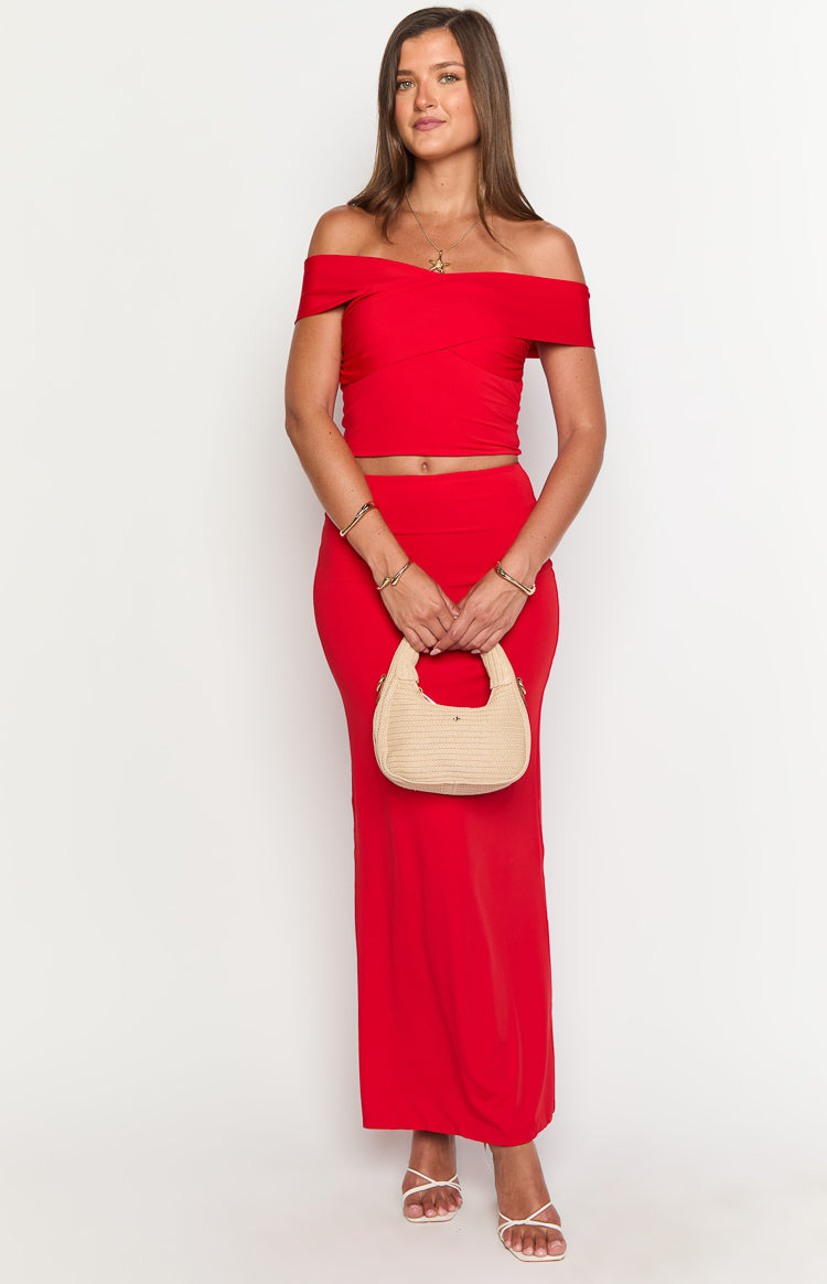 Front view of a red off-the-shoulder crop top with a crossover bust detail and a fitted silhouette