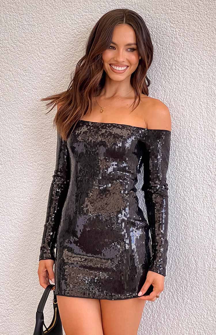 Black sequin mini dress with an off-shoulder neckline and long sleeves
