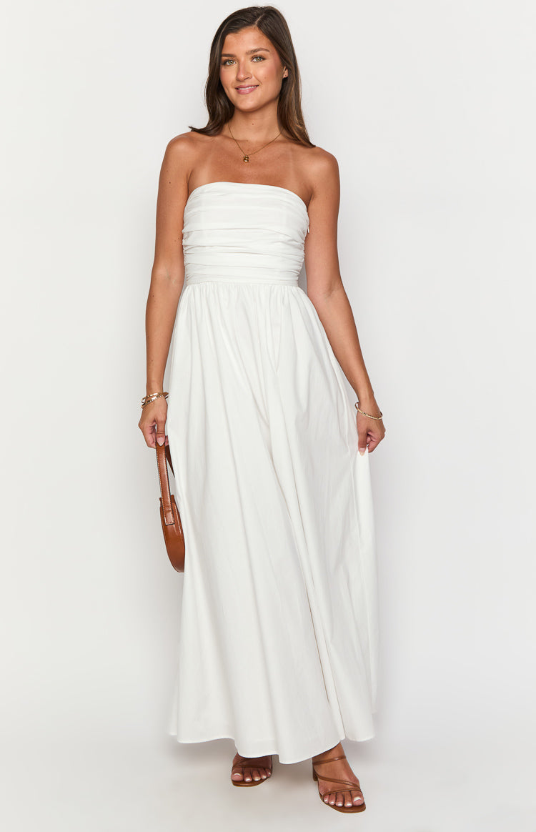 White strapless maxi dress with a ruched bodice and a full, gathered skirt