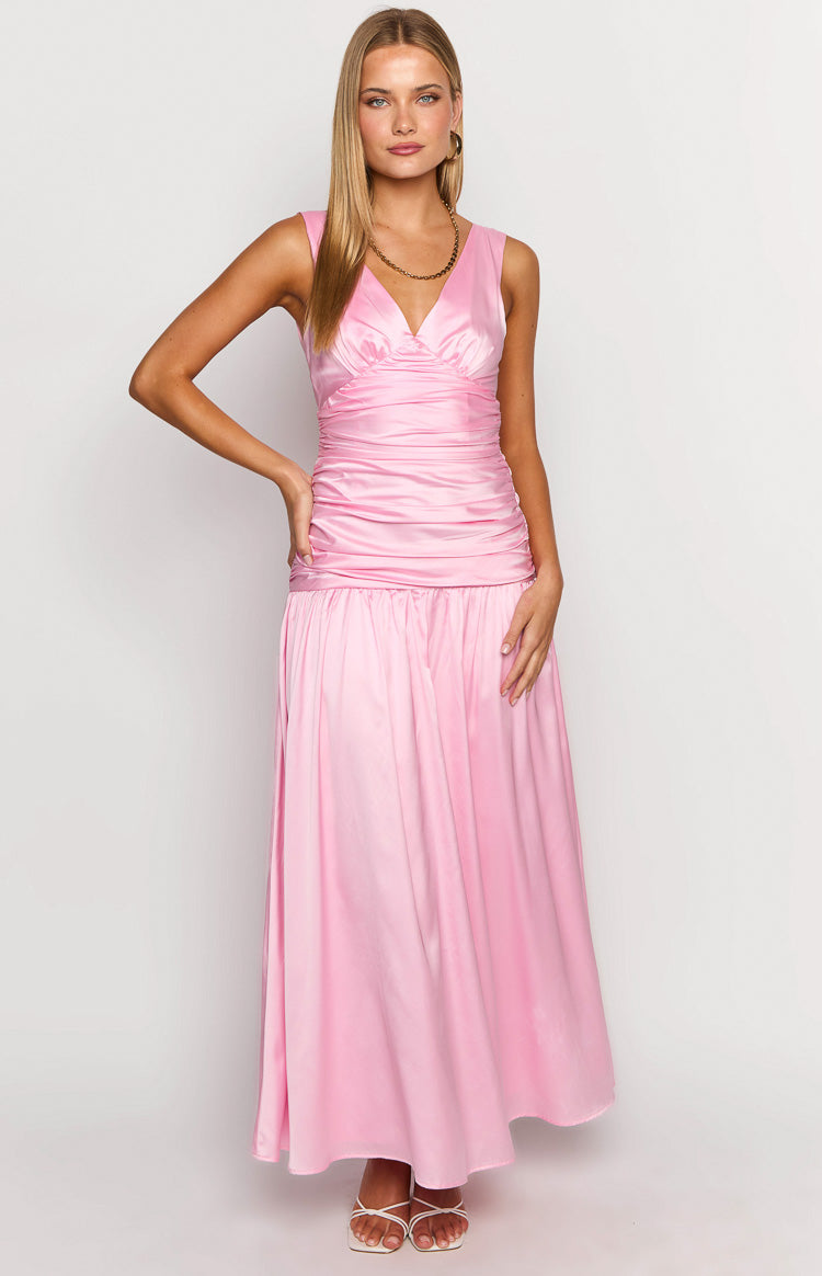 Front view of a pink sleeveless V-neck maxi dress with a gathered bodice and a flowing skirt