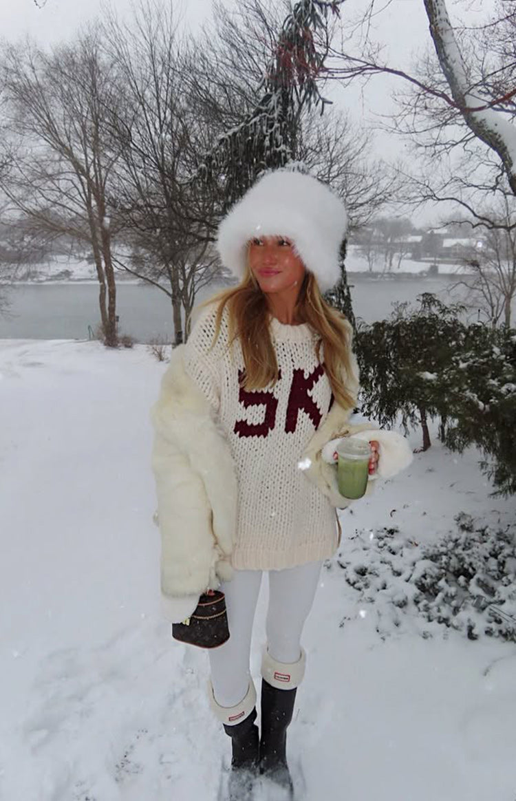 Cream chunky knit sweater with burgundy jacquard 'SKI' text and a relaxed fit