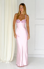 Pink satin maxi dress with a sweetheart neckline, ruched rhinestone bust, and thin rhinestone straps