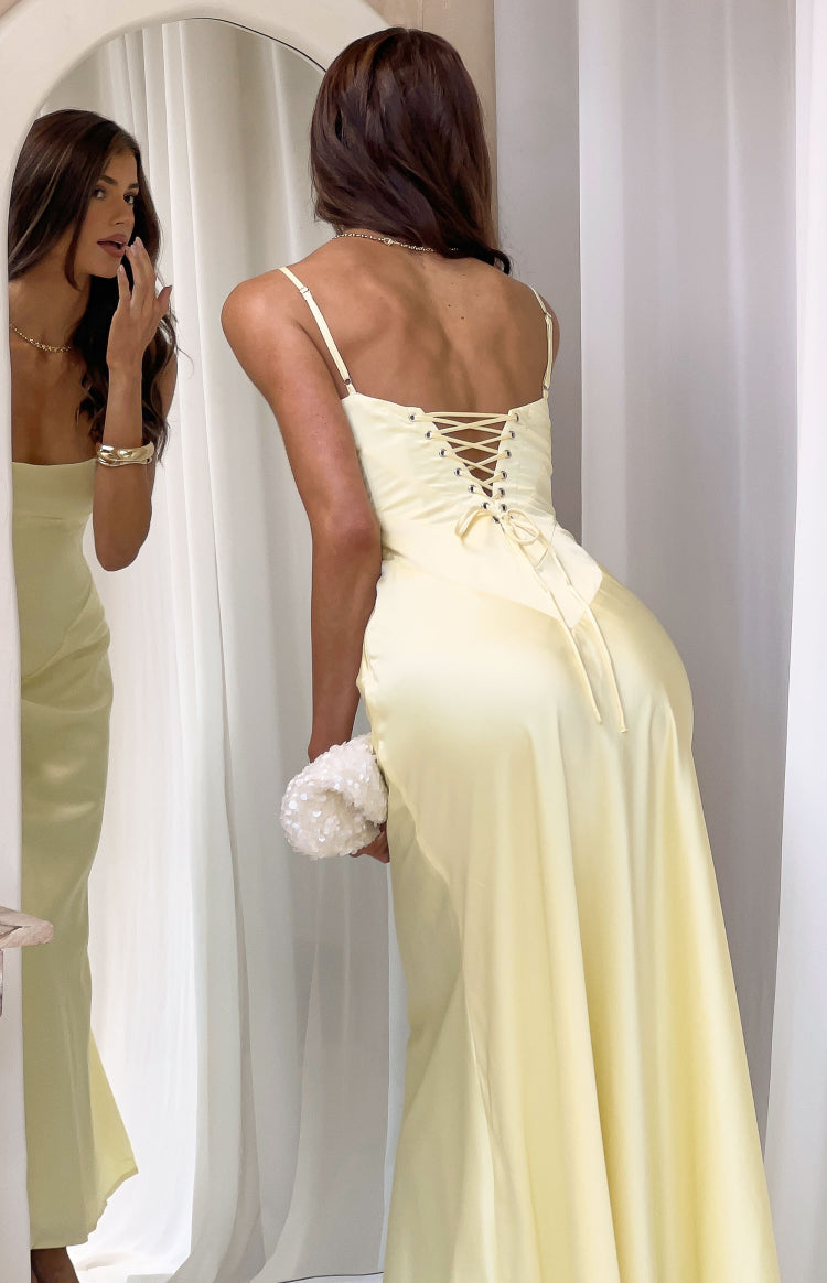 Beginning Boutique Joey Yellow Maxi Dress pale yellow satin maxi dress with spaghetti straps and a lace-up corset back