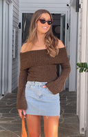 Brown off-shoulder ribbed knit sweater with a wide fold-over neckline and long flared sleeves