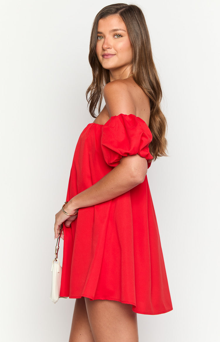 Side view of a red off-the-shoulder mini dress with puff sleeves and a flowy A-line skirt