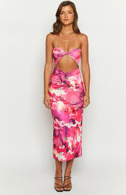 Twisted strapless bust and large waist cutout on a pink floral midi dress