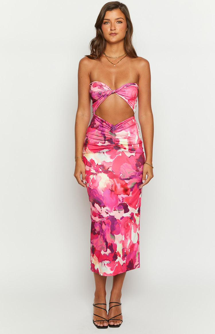Twisted strapless bust and large waist cutout on a pink floral midi dress