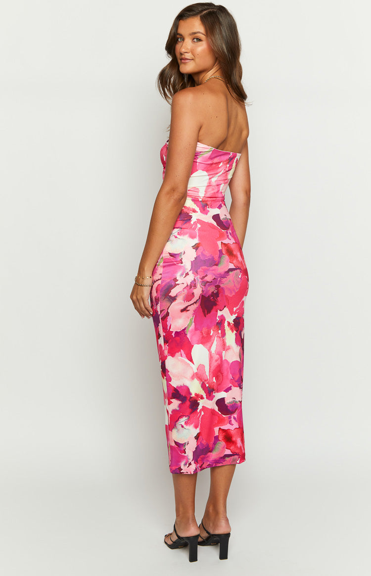 Side view of the pink floral strapless midi dress, showing the vibrant abstract floral pattern and fitted silhouette