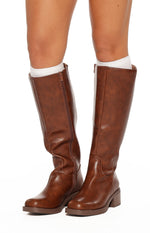 Side view of cognac mid-length boots with full-length zipper and chunky block heel