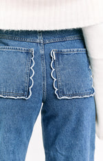 Kansis Mid Wash Scallop Pockets Uneven Waist Jeans Image