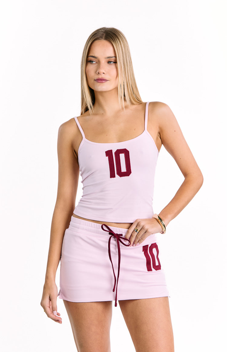 Beginning Boutique Karey Pink Jersey Top light pink jersey cami top with thin spaghetti straps and a large maroon number 10 graphic