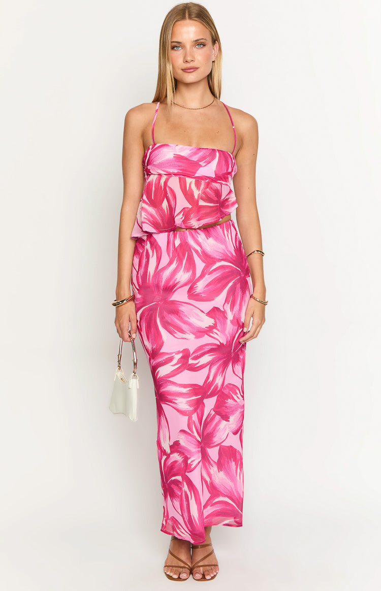 Front view of a pink floral maxi skirt with large fuchsia and light pink abstract flowers and a straight fit