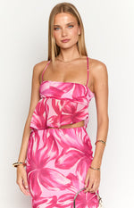 Pink floral crop top with a ruffled overlay and delicate halter straps