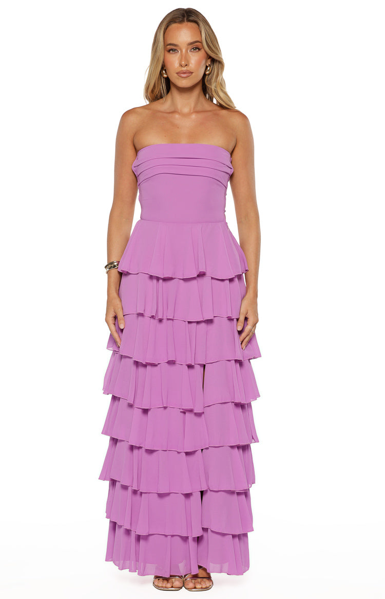 Magenta strapless maxi dress with a pleated bodice and full tiered ruffle skirt