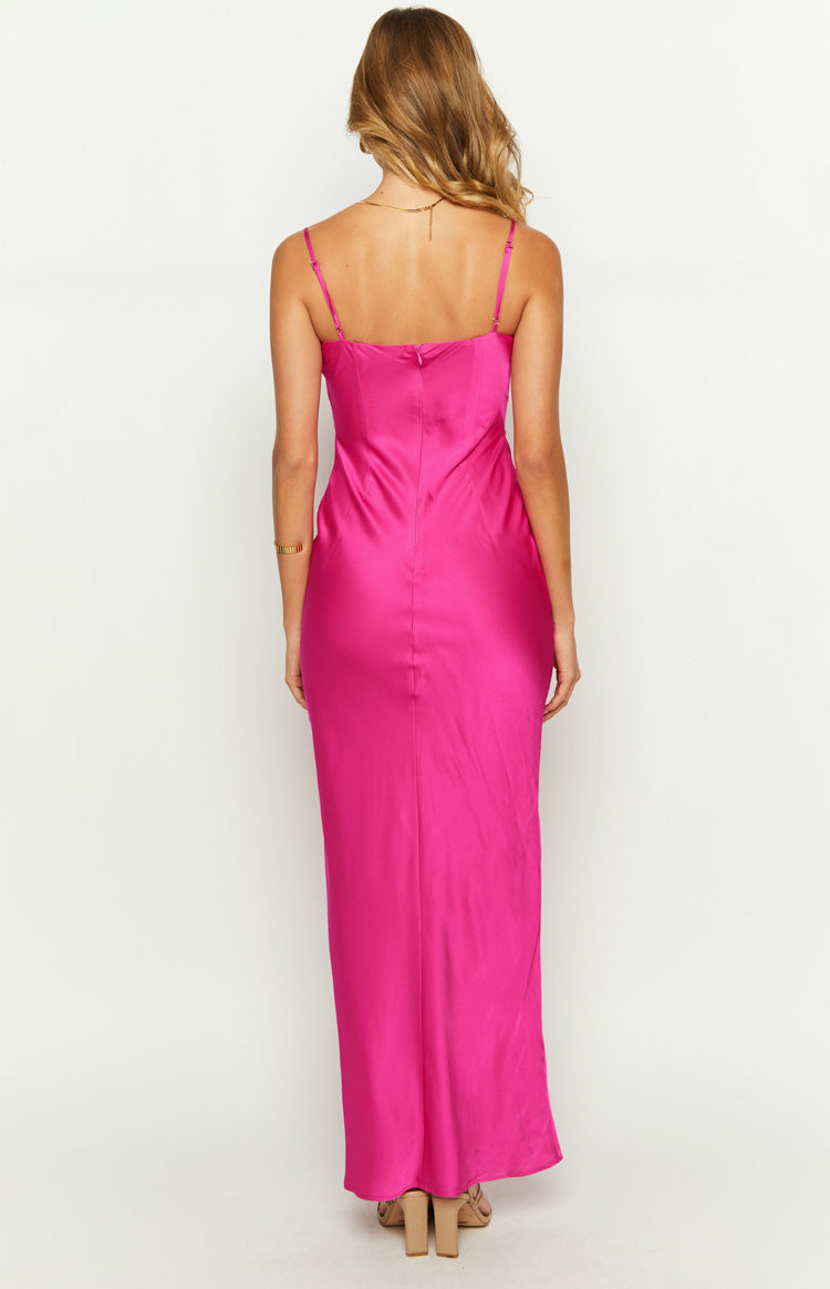 Rear view of a fuchsia satin maxi dress with thin spaghetti straps and a straight back neckline