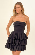 Black strapless mini dress with a pleated bandeau bodice and a three-tiered ruffle skirt