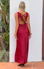 Rear view of a wine satin maxi dress with a low scoop back and tie-back detail