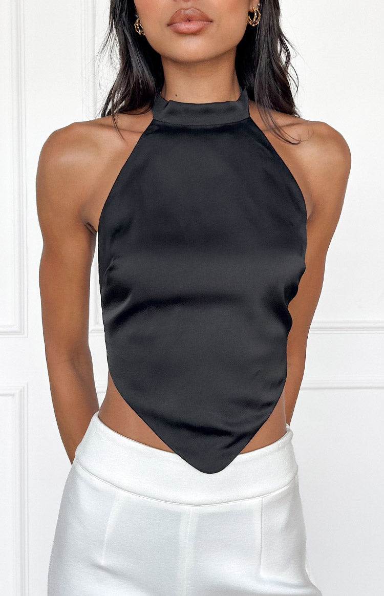 Front view of a black satin high neck halter top with a pointed handkerchief hem