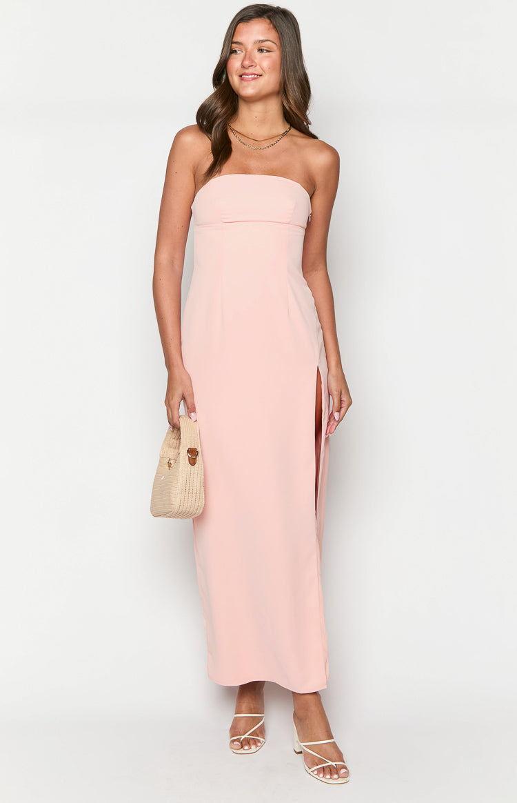 Pink strapless maxi dress with a fitted bodice and a high side split