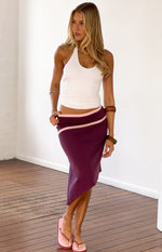 Grape fitted asymmetric midi skirt with pink contrast binding detail and a draped hem