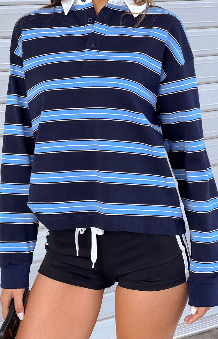 Black athletic shorts with a white drawstring and white vertical side stripes