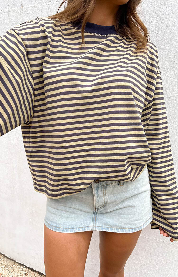 Beige and navy striped relaxed long sleeve top with a ribbed crew neck