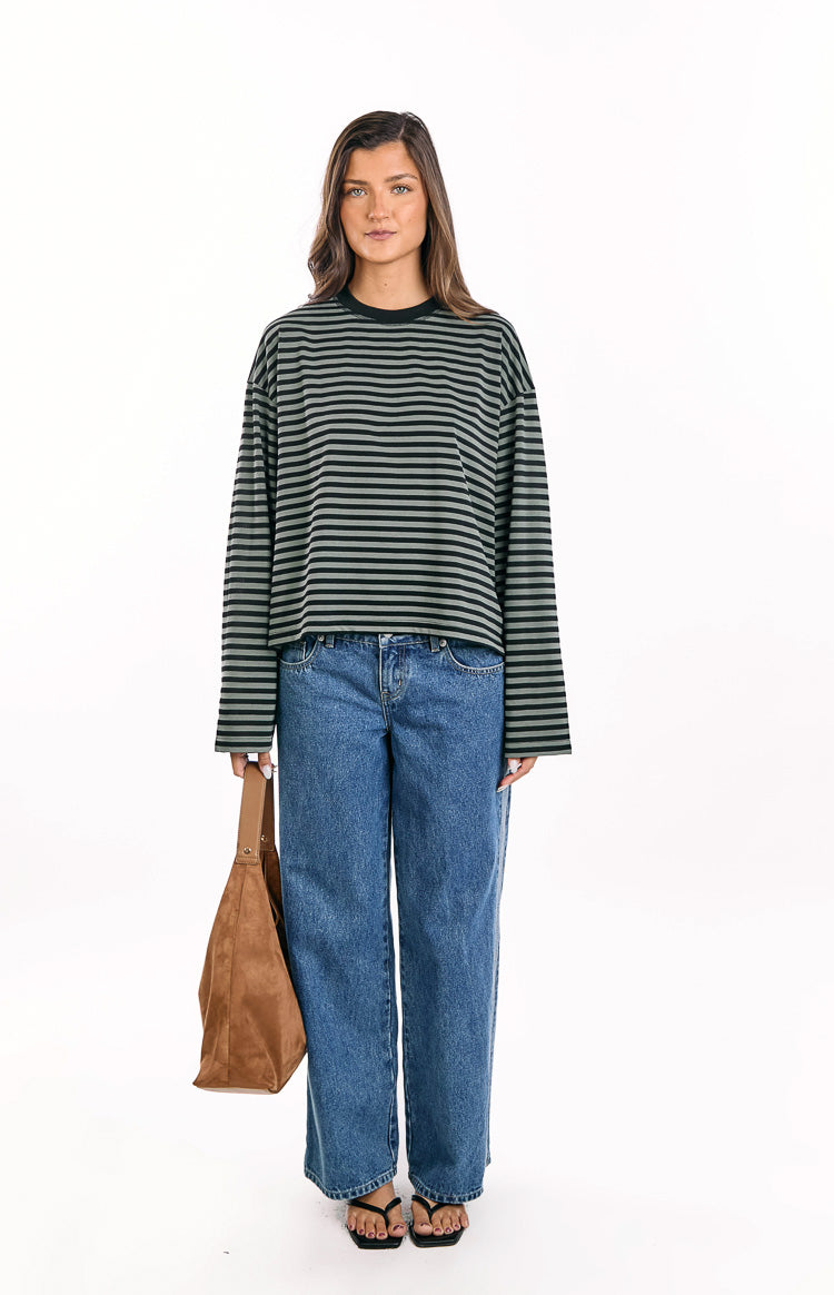 Forest green and black striped long sleeve top with a relaxed fit and cropped hem