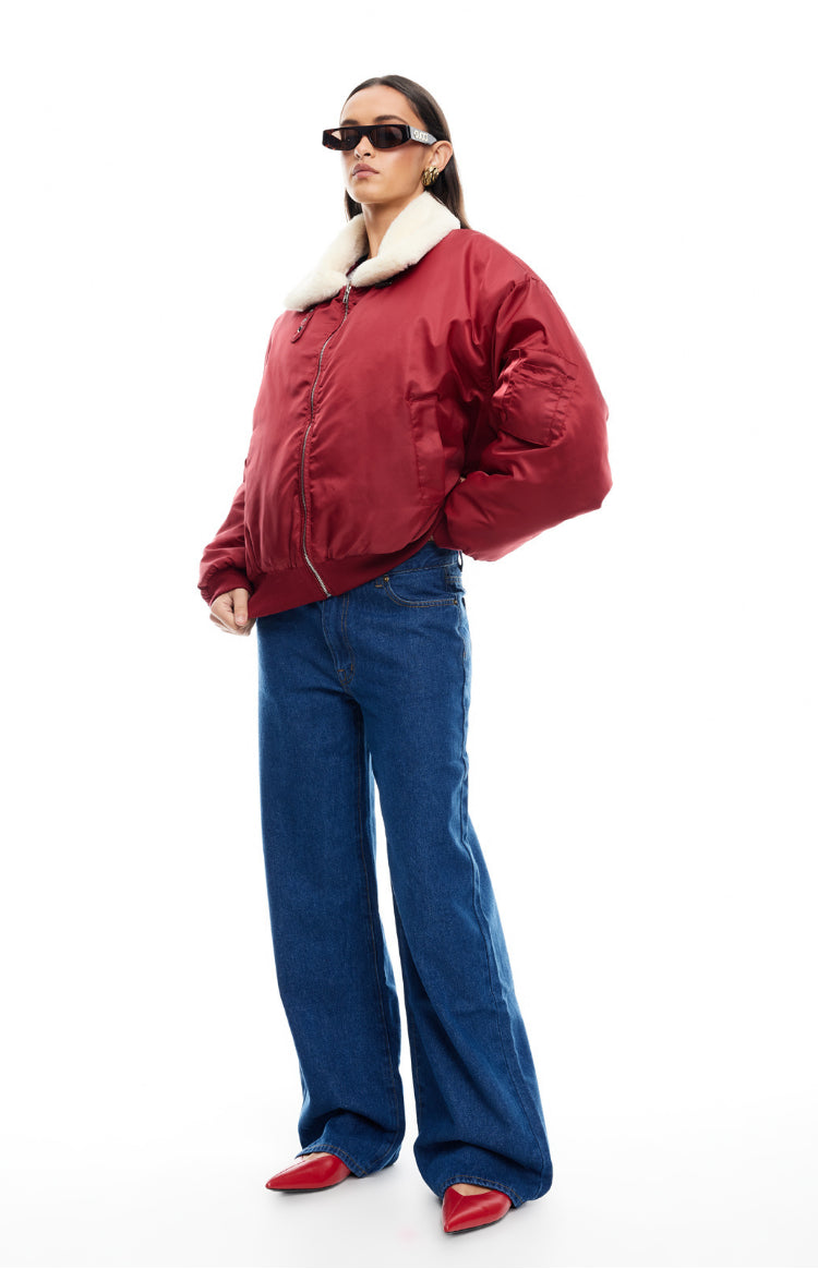 Front view of a mulberry puffer jacket featuring a cream faux fur collar, silver zip, and ribbed hem and cuffs