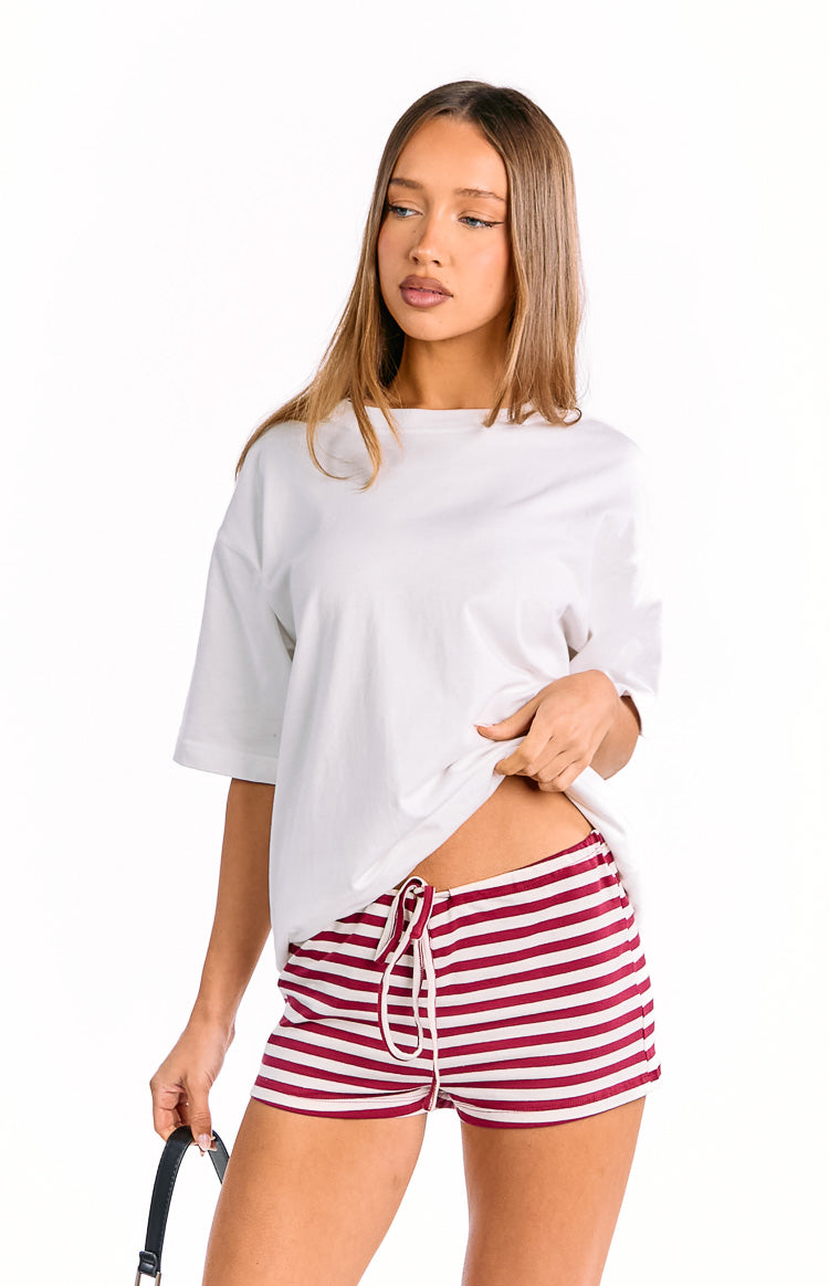 Close-up of wine and white striped bloomers with a white drawstring waist and elasticated waistband