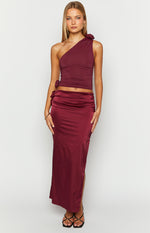 Burgundy satin maxi skirt with ruched side detail and a high side slit