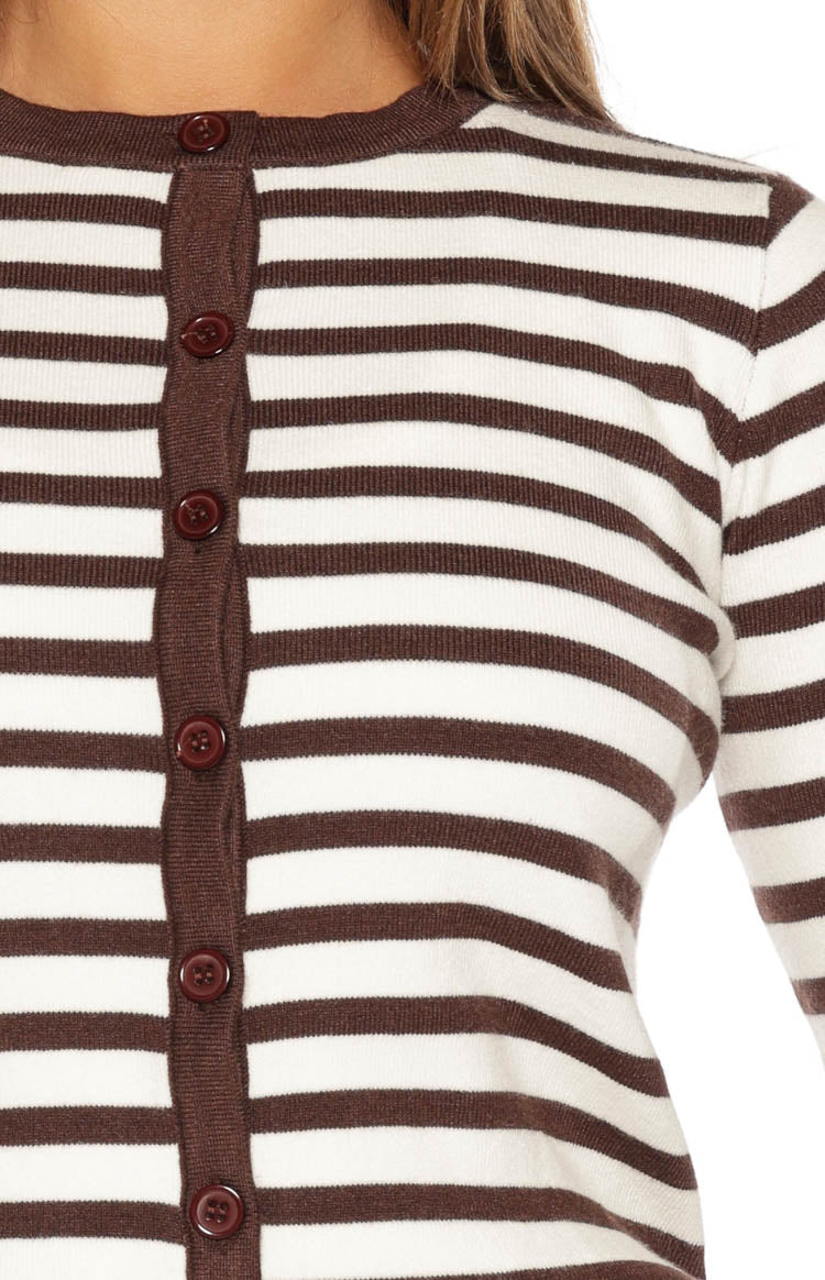 Close-up of the chocolate brown and white striped knit cardigan, showing the round neck and button placket