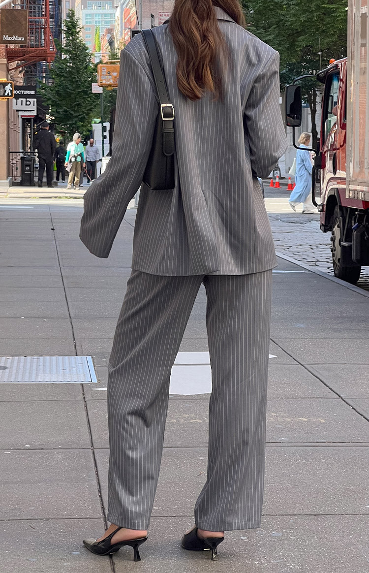 Beginning Boutique Louis Grey Striped Pants grey pinstripe wide-leg pants with a relaxed fit