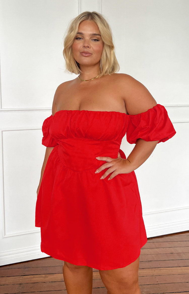 Front view of a red off-the-shoulder mini dress with elasticated puff sleeves and ruched waist