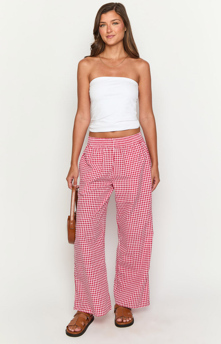 Red gingham wide-leg pants with a relaxed fit and elasticated high waist
