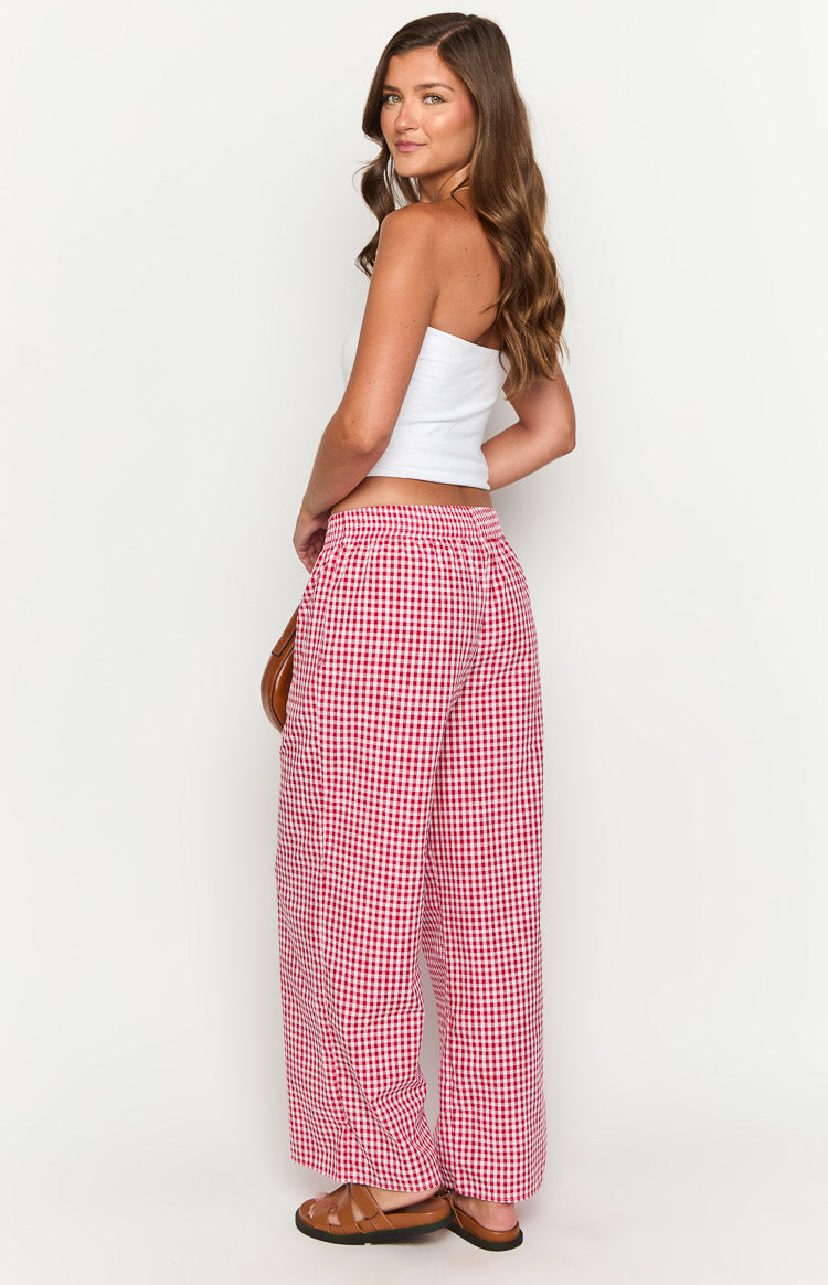 Side-rear view of red and white gingham wide-leg pants with an elasticated back waistband
