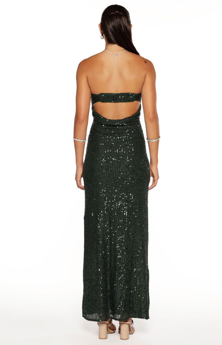 Rear view of an emerald green sequin maxi dress with a strapless neckline and back cutouts