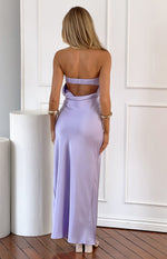 Rear view of a lilac satin maxi dress with a strapless shirred back band and draped open back