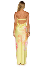 Rear view of a yellow satin strapless maxi dress with an elasticated back band, low cowl back, and hibiscus print