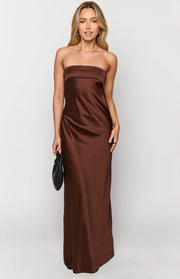 Front view of a brown strapless satin maxi dress with a fitted bodice and flowing skirt