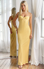 Yellow satin bodycon midi dress with lace trim bust and spaghetti straps, showing a low scoop back in reflection