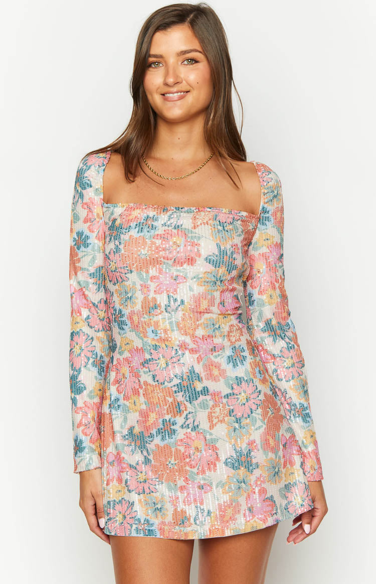 Close-up of the pink sequin floral print mini dress with a square neckline and long sleeves