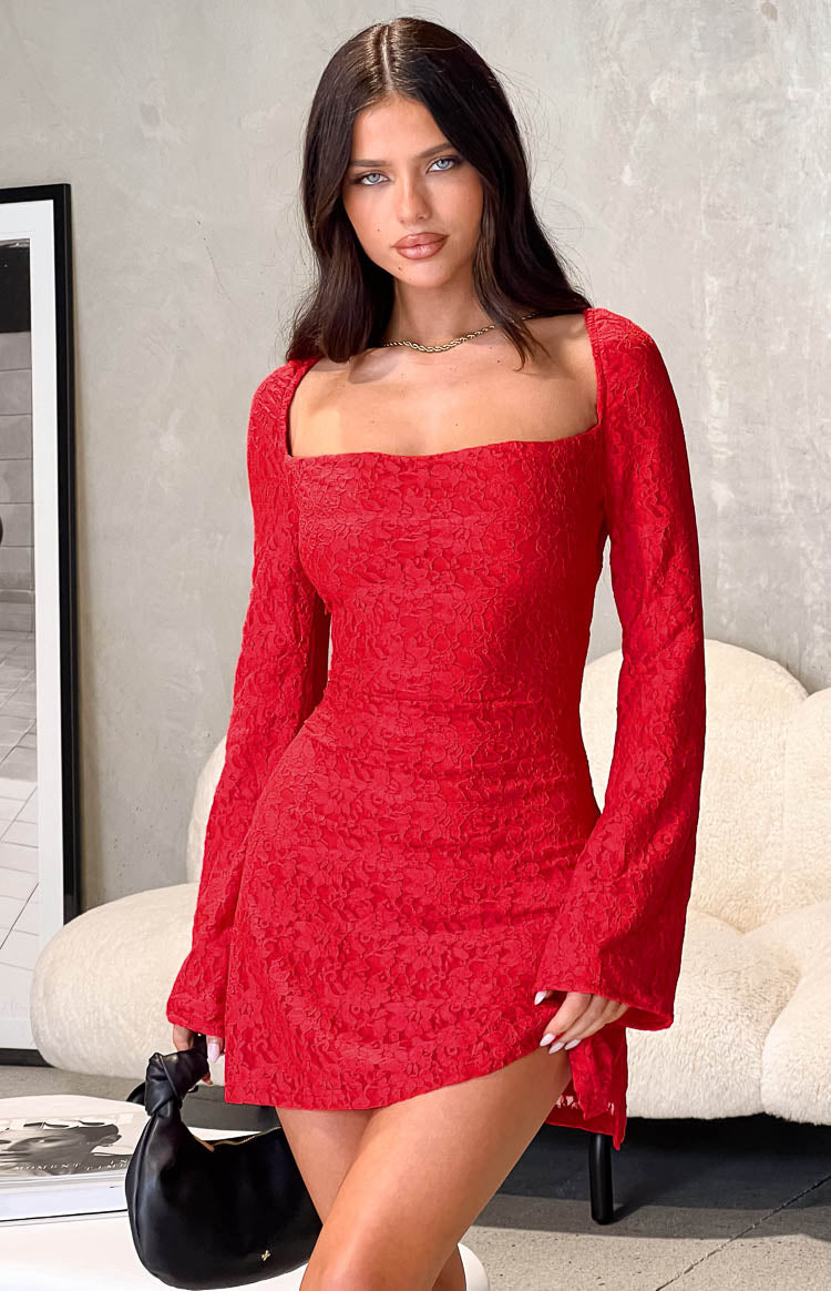 Front view of a red textured lace mini dress with a square neckline and long sleeves