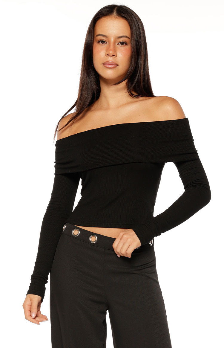 Black ribbed knit off-shoulder long sleeve top with a wide folded neckline
