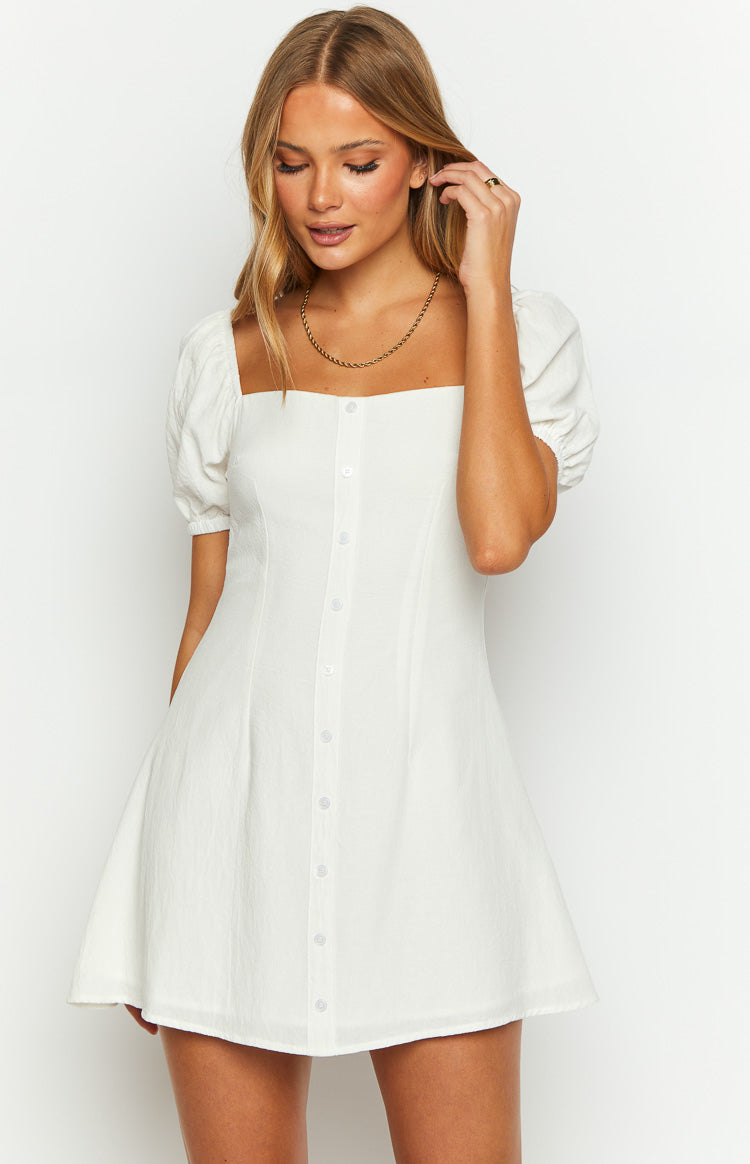 Beginning Boutique Maysen White Cap Sleeve Mini Dress white textured square neck mini dress with puffed cap sleeves and button front