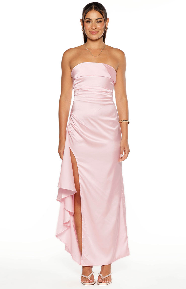 Light pink strapless maxi dress with ruched bodice, high leg split, and cascading ruffle detail